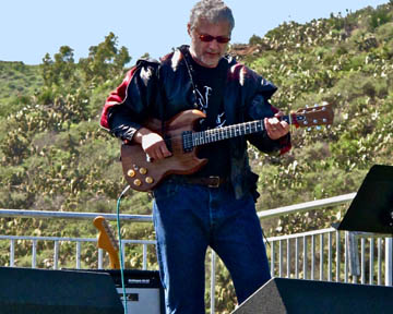 Kevin Volkan on guitar